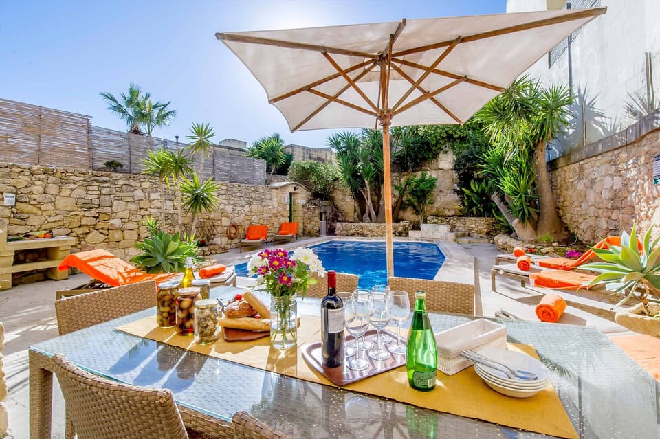 Pool area of Djar ta' Menzja 3 Gozo villa with pool