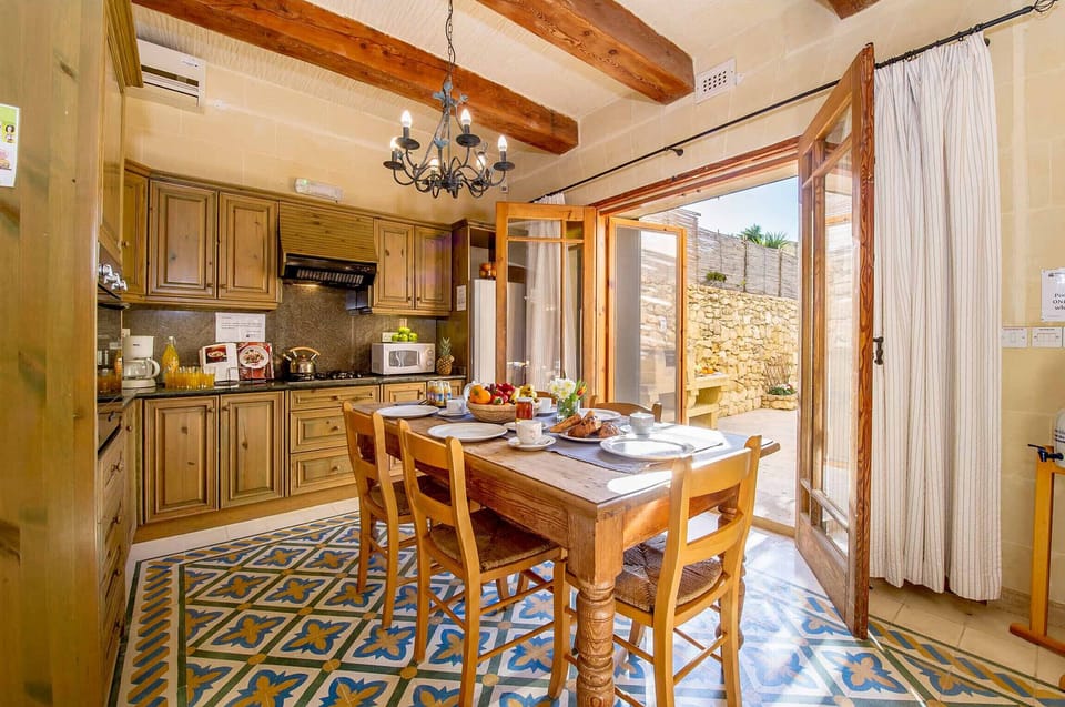 Kitchen and Dining area of Djar ta' Menzja 3 holiday home in Gozo, Malta