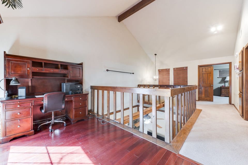 Office area with printer available for guest  use. 