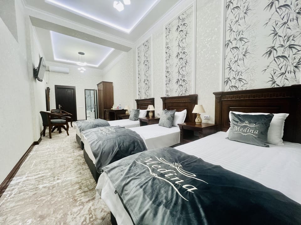 Deluxe Triple Room | Premium bedding, in-room safe, soundproofing, WiFi (free)