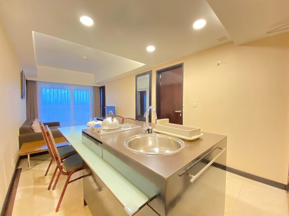 Apartment, 2 Bedrooms | Private kitchen | Fridge, stovetop, cookware/dishes/utensils, dining tables