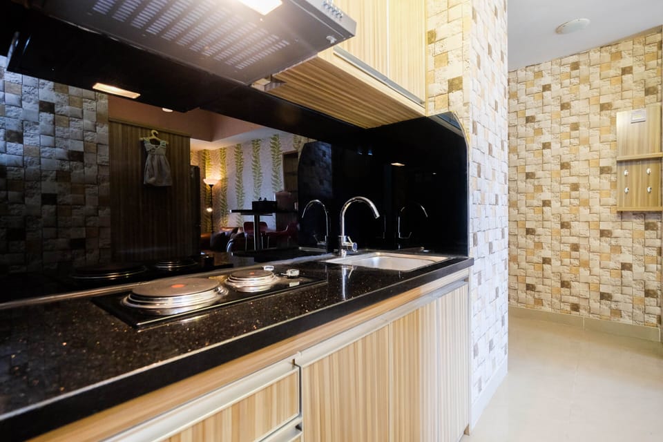 Apartment, 1 Bedroom | Private kitchen | Fridge, stovetop, cookware/dishes/utensils, dining tables