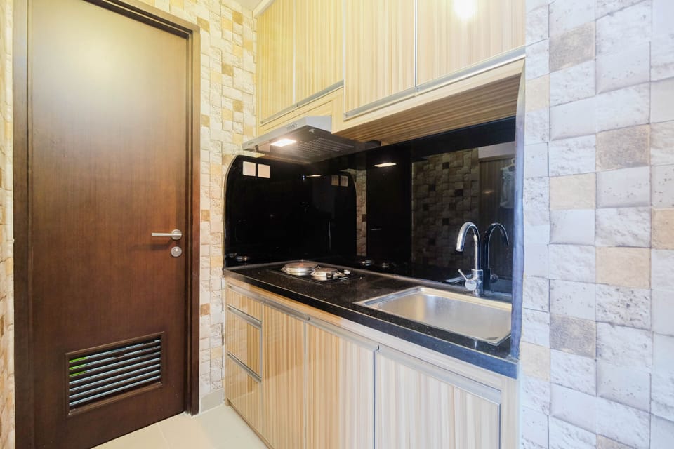 Apartment, 1 Bedroom | Private kitchen | Fridge, stovetop, cookware/dishes/utensils, dining tables