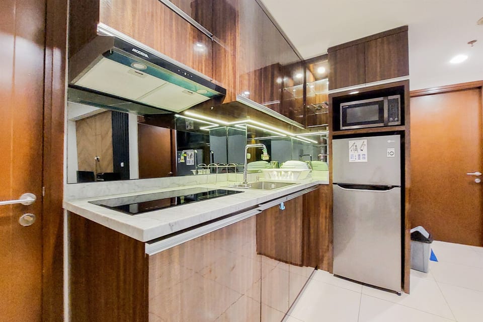 Apartment, 2 Bedrooms | Private kitchen | Fridge, stovetop, electric kettle, cookware/dishes/utensils