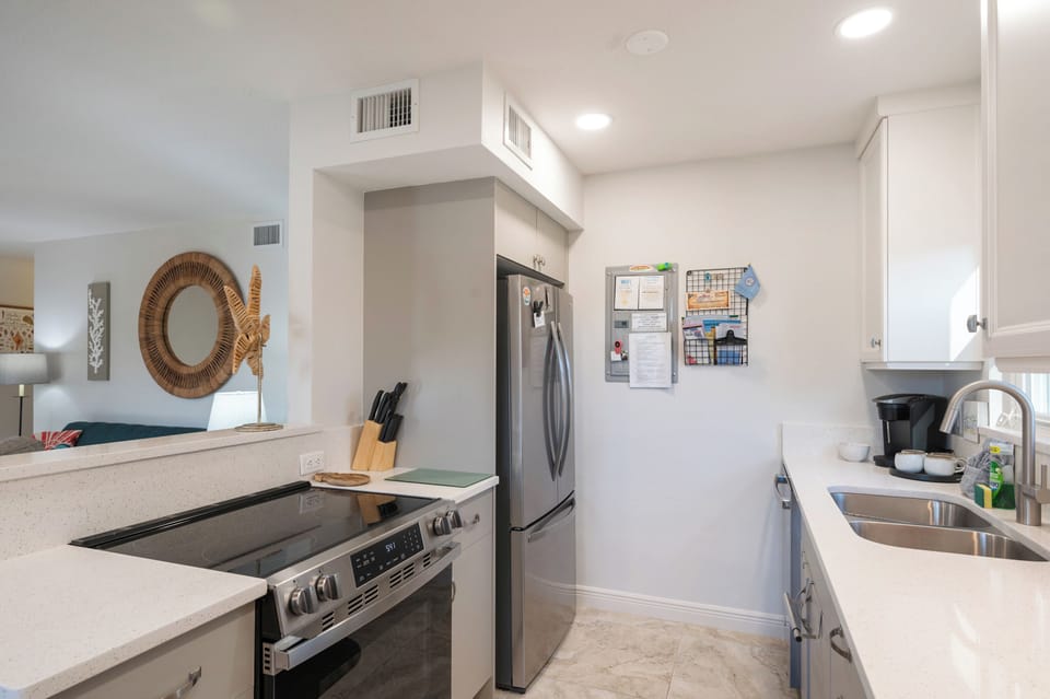 Fully equipped kitchen with stainless appliances