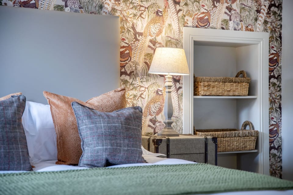 Deluxe King Room | Individually decorated, individually furnished, iron/ironing board