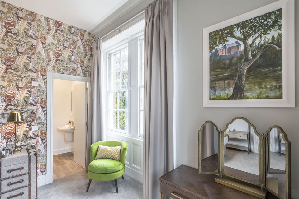 Deluxe King Room | Individually decorated, individually furnished, iron/ironing board