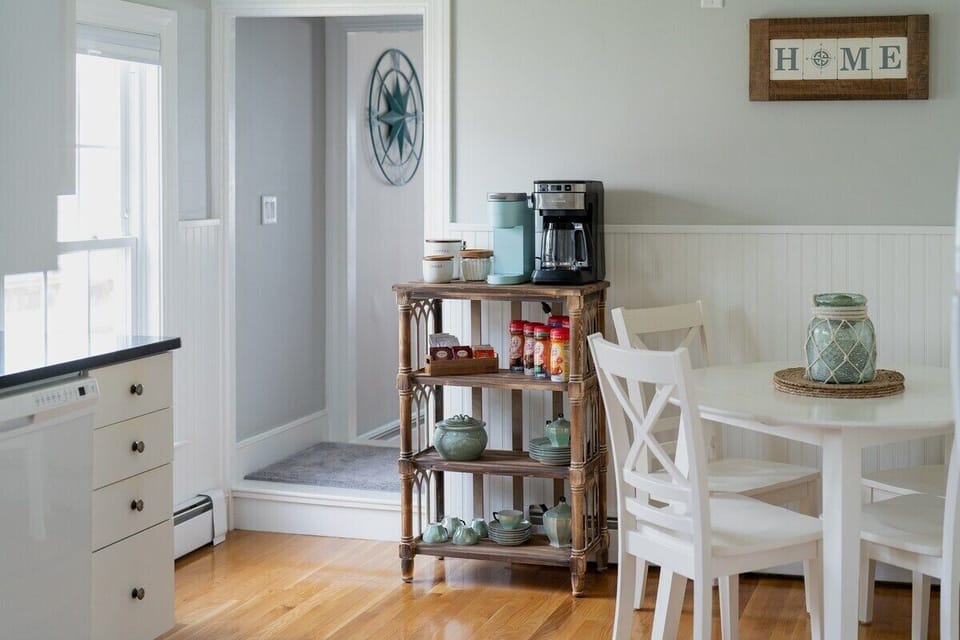 Fully stocked kitchen with tea and coffee.