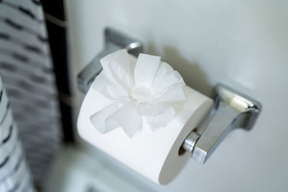 Three rolls of toilet paper supplied per bathroom.