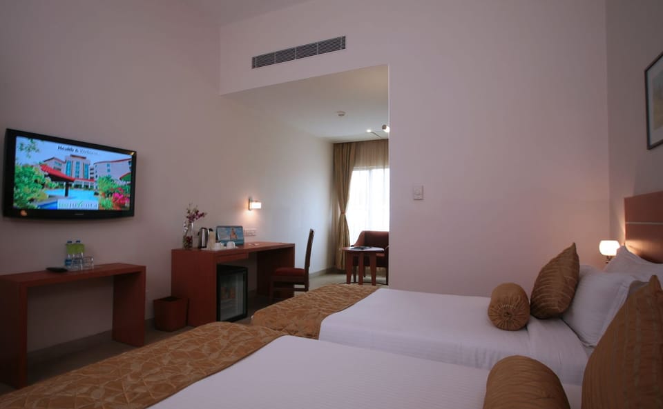 Oh Biz Executive room | In-room safe, iron/ironing board, bed sheets