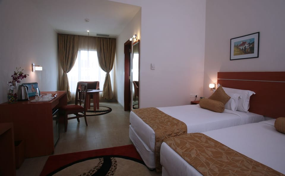 Oh Biz Executive room | In-room safe, iron/ironing board, bed sheets
