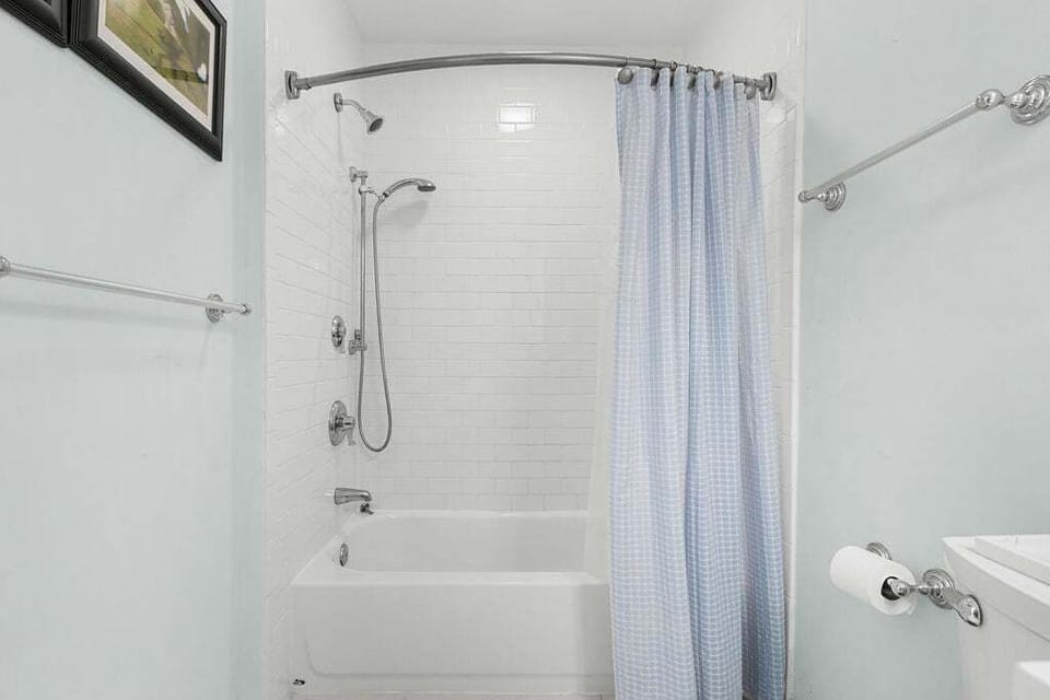 The primary bath has a tub/shower combo