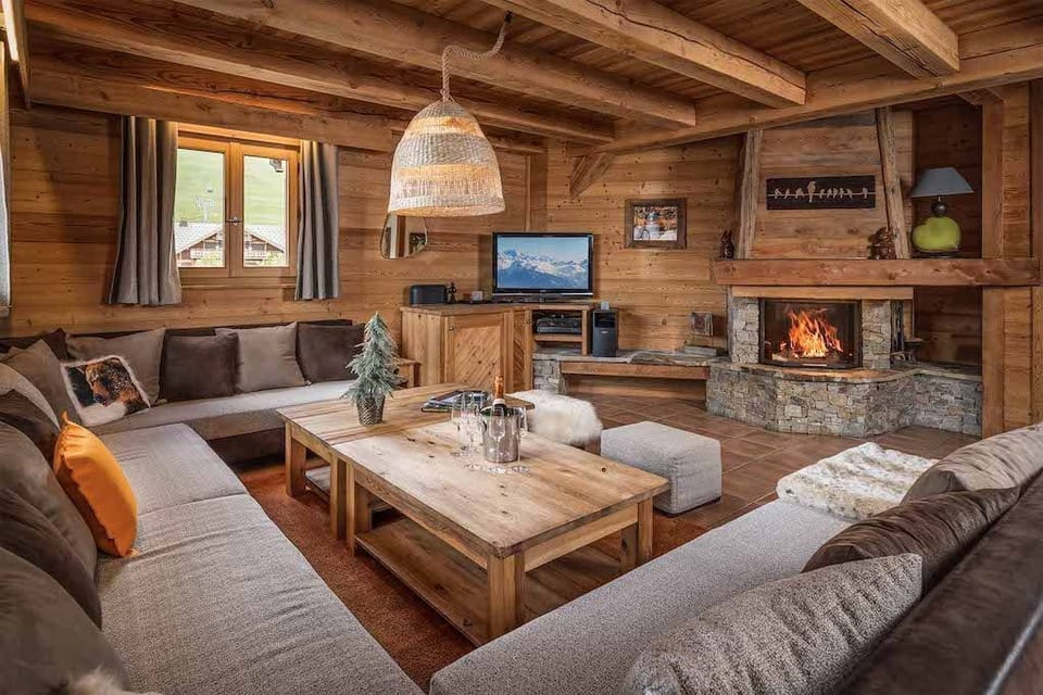 Take a seat in front of the fireplace and enjoy a movie in the living area.