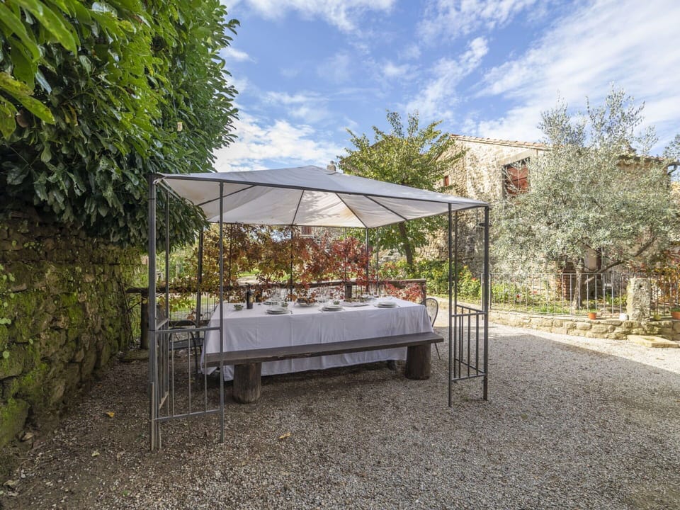 Sky, Plant, Property, Cloud, Plant Community, Shade, Tree, Outdoor Furniture, Architecture, Outdoor Bench