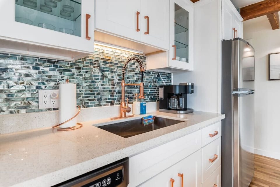 Kitchen is stocked with coffee for your enjoyment.  Also included are dishes, utensils, dish detergent, paper towels, and other needed kitchen items to make your stay as comfortable as possible.