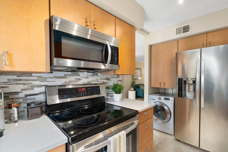 Electric stove, oven, and microwave all available for your use.
