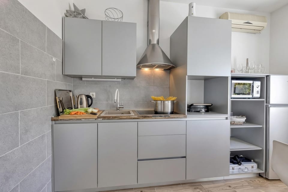 Family Apartment, 1 Bedroom, Microwave (Pool And Garden Apartment Happy Sound) | Private kitchen | Fridge, microwave, stovetop, dishwasher