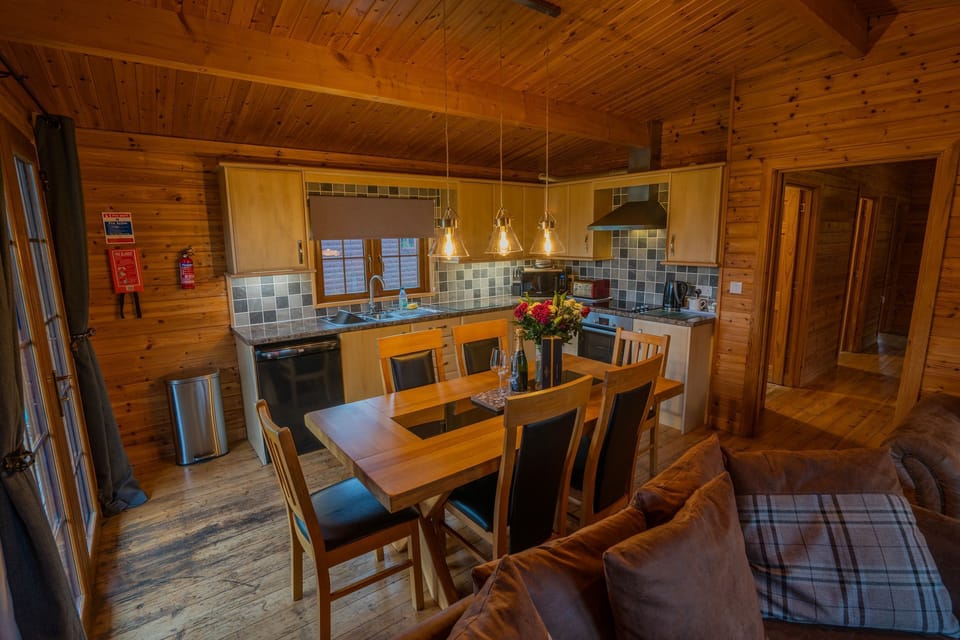 Kitchen dining area with grassy views