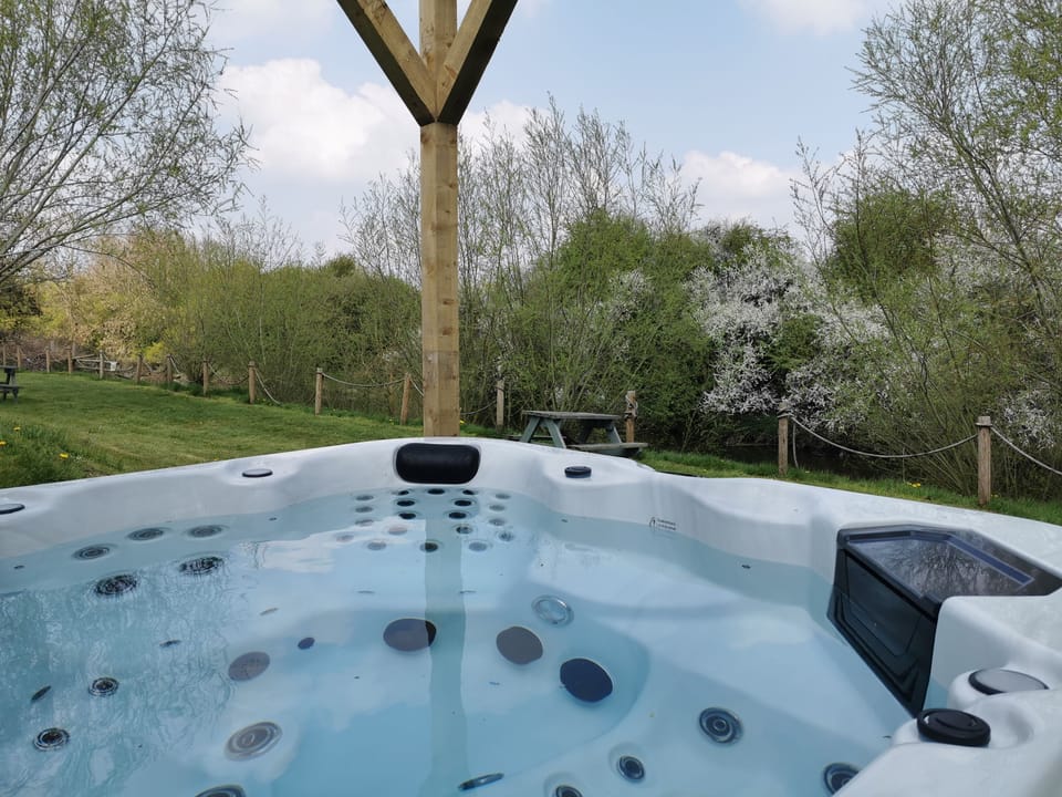 Private hot tub with river views