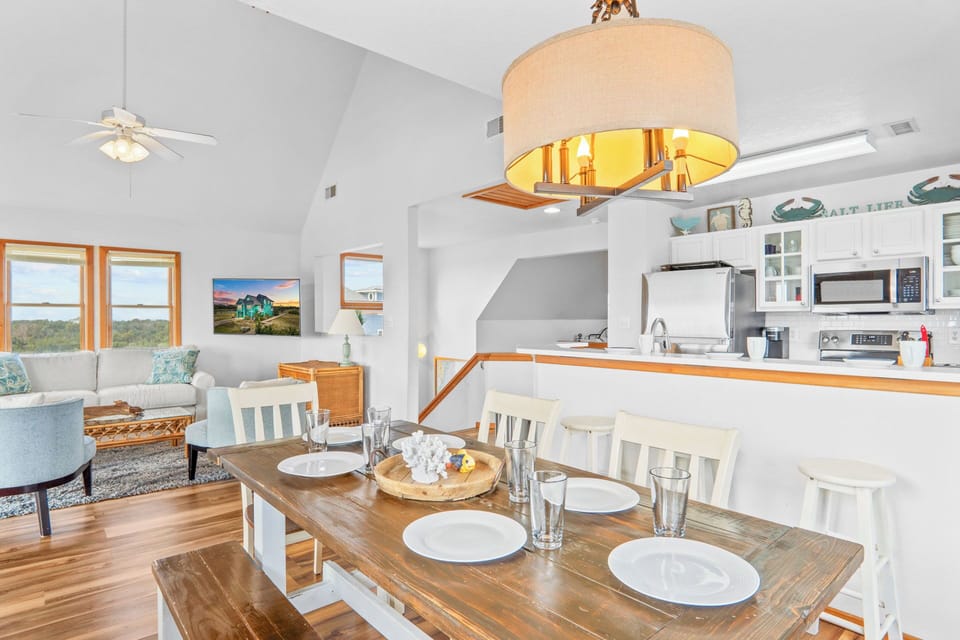surf-or-sound-realty-1069-avon-anchor-management-dining-area-2