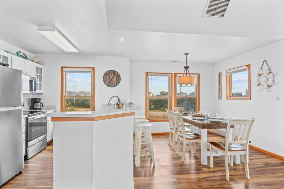 A breathtaking great room with seamless access to a private deck, perfect for indoor-outdoor living.