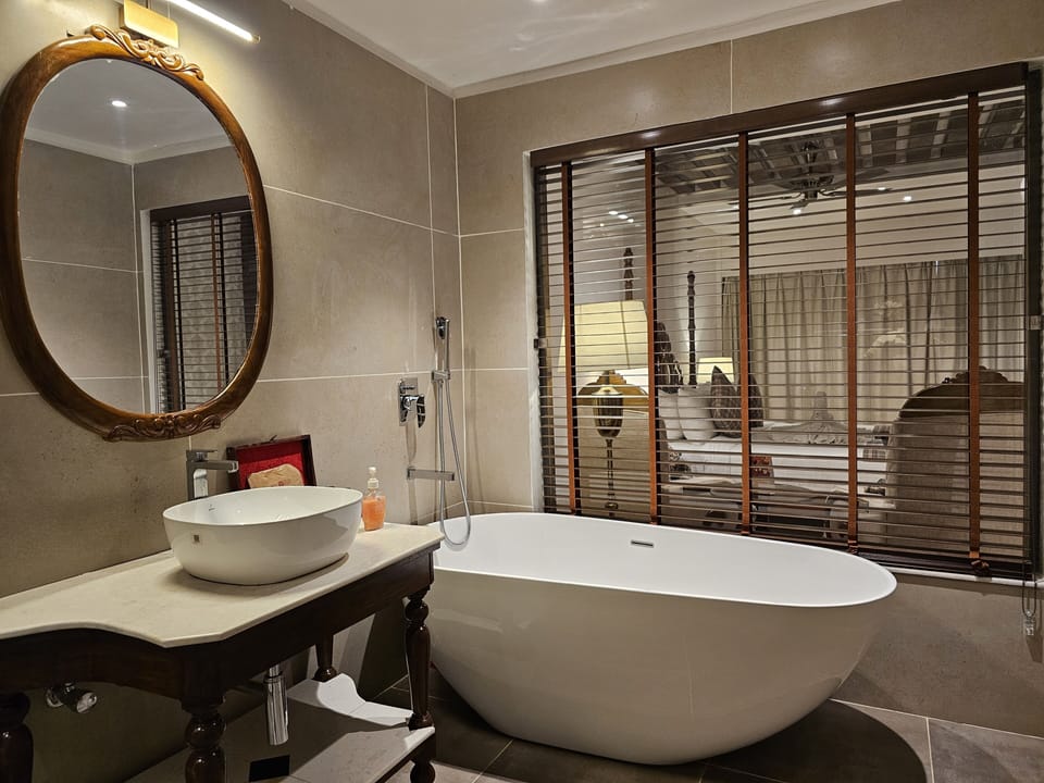 Royal Room | Bathroom | Separate tub and shower, designer toiletries, slippers, towels