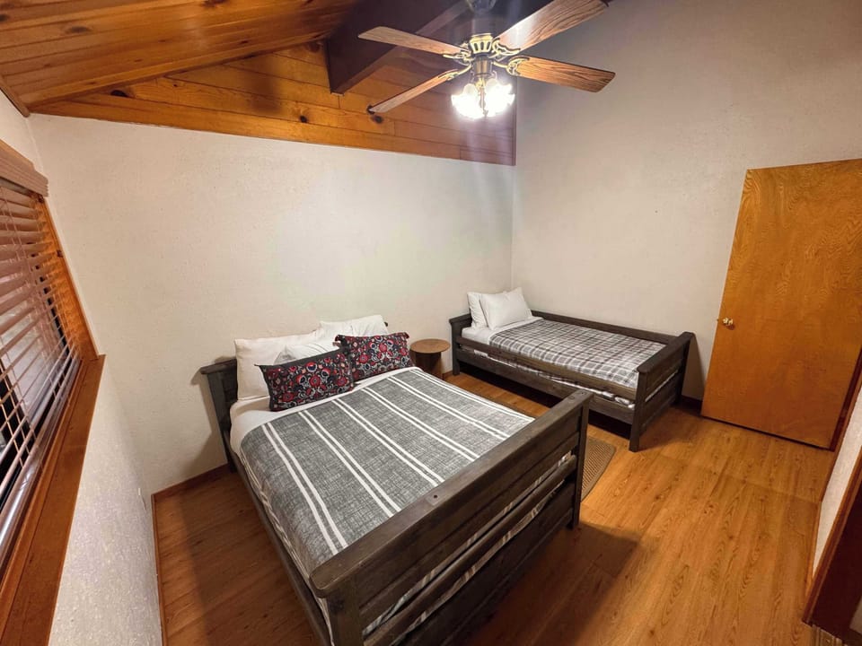 2nd Bedroom with a comfy full bed and twin bed.