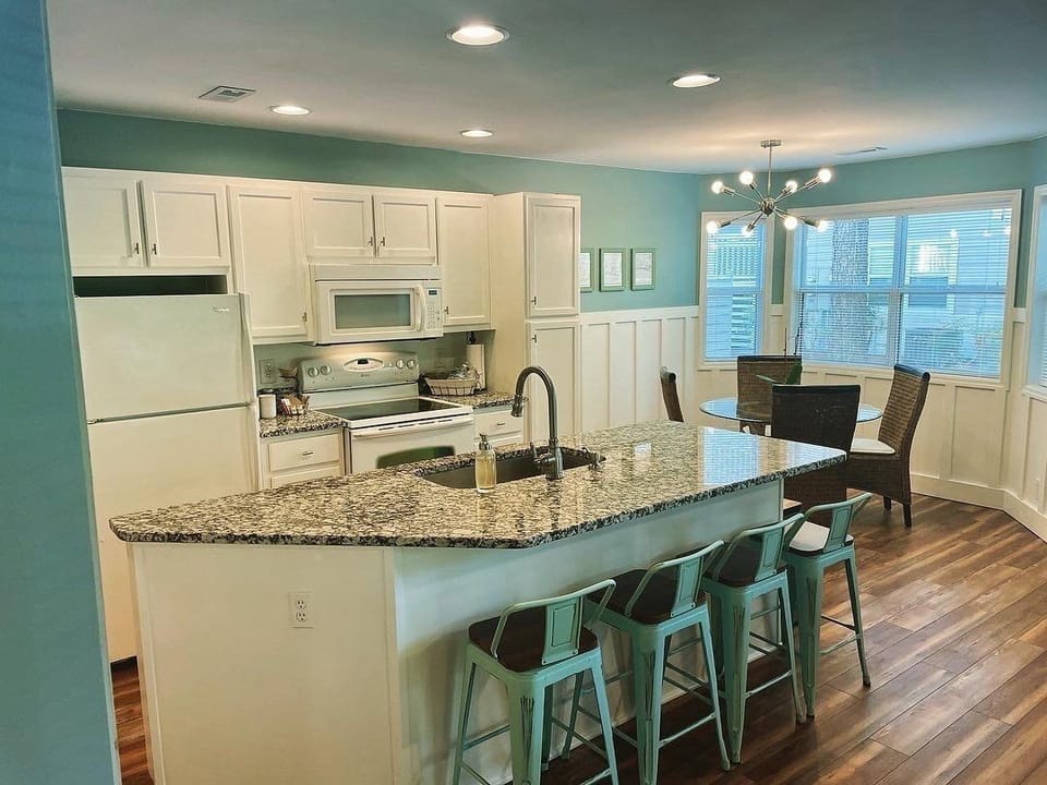 Kitchen has been updated to be both visually pleasing and functionally equipped.