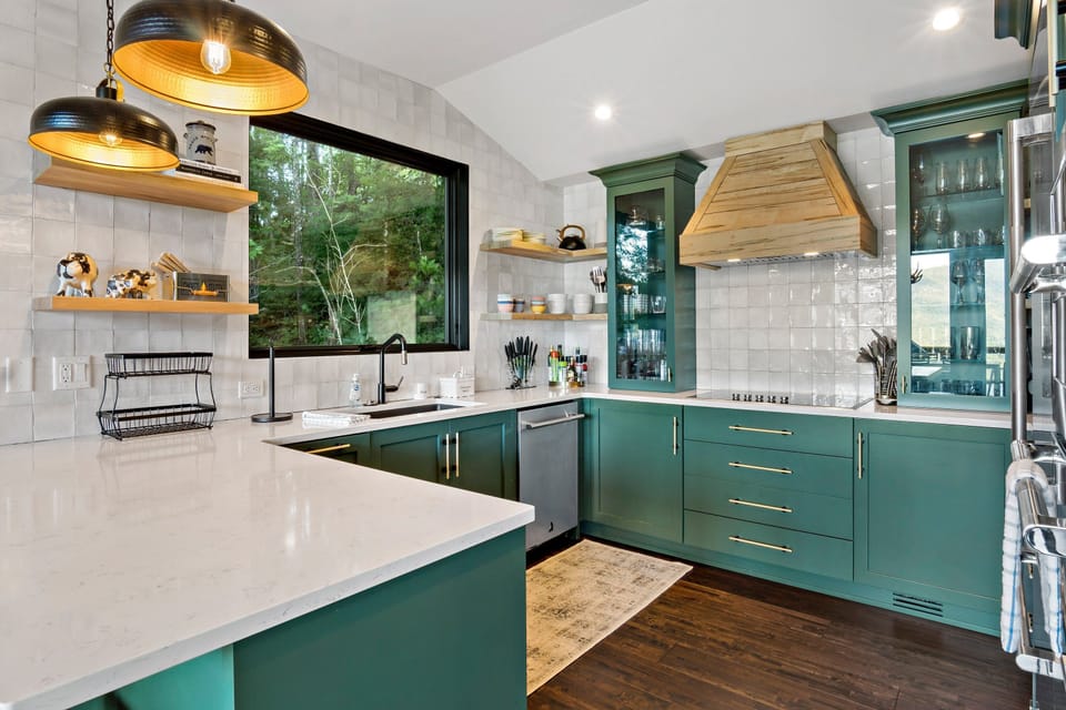 Craft delicious meals in the gourmet kitchen before enjoying them together at the dining table.