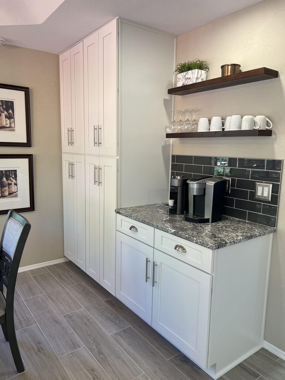Coffee bar with tall pantry cabinets
