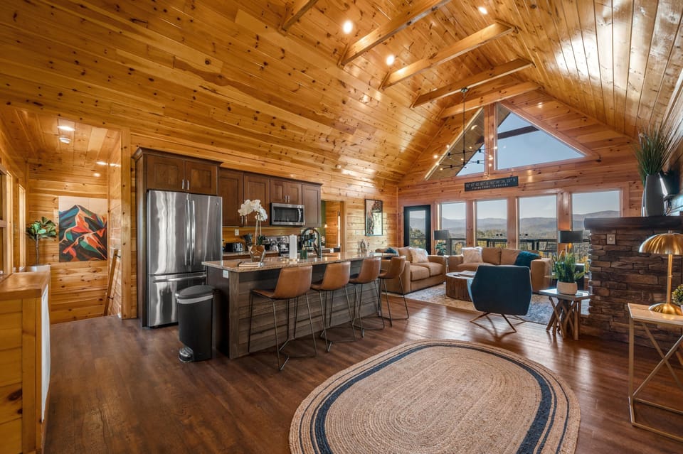 Upon entering the front door you are greeted by a 20' vaulted ceiling and VIEWS!
