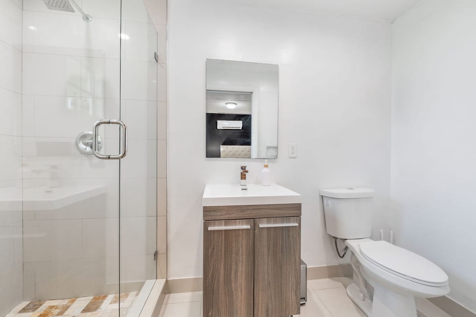 Modern bathroom with a spacious glass-enclosed