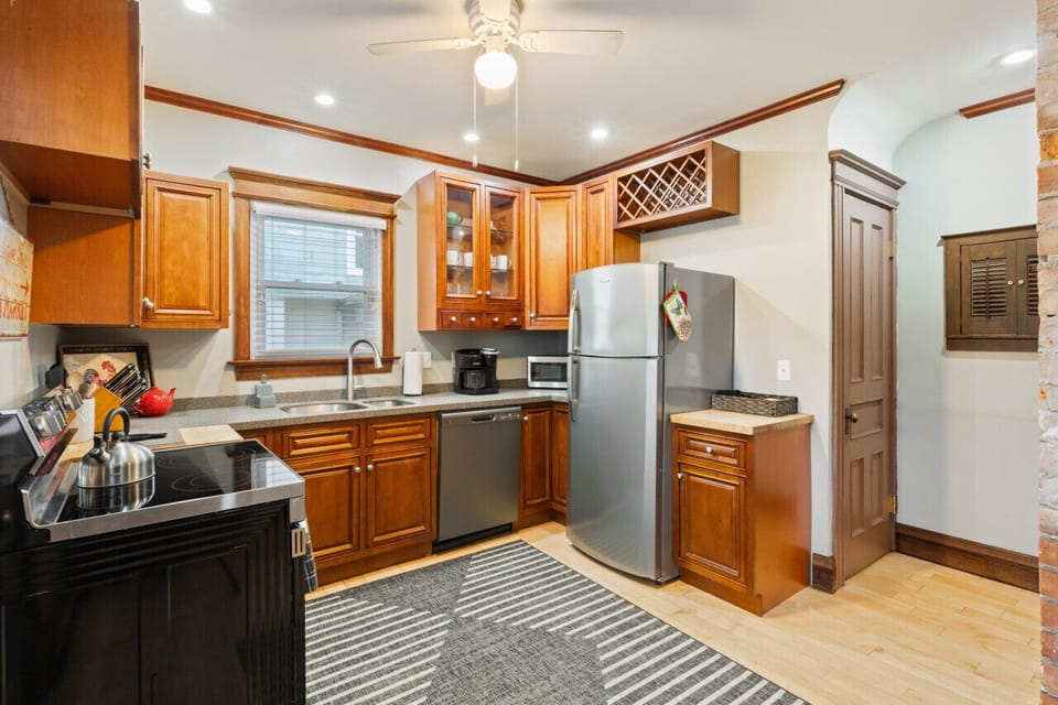Sizeable kitchen with refrigerator, stove/oven, microwave and dishwasher.