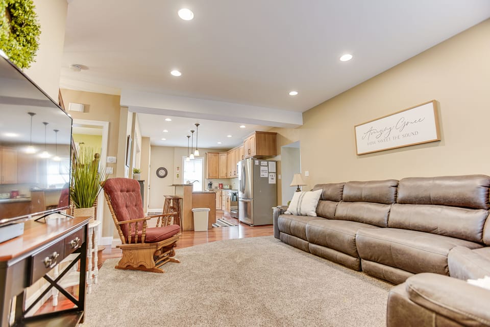 Catch up on your favorite TV shows in the comfortable living room!