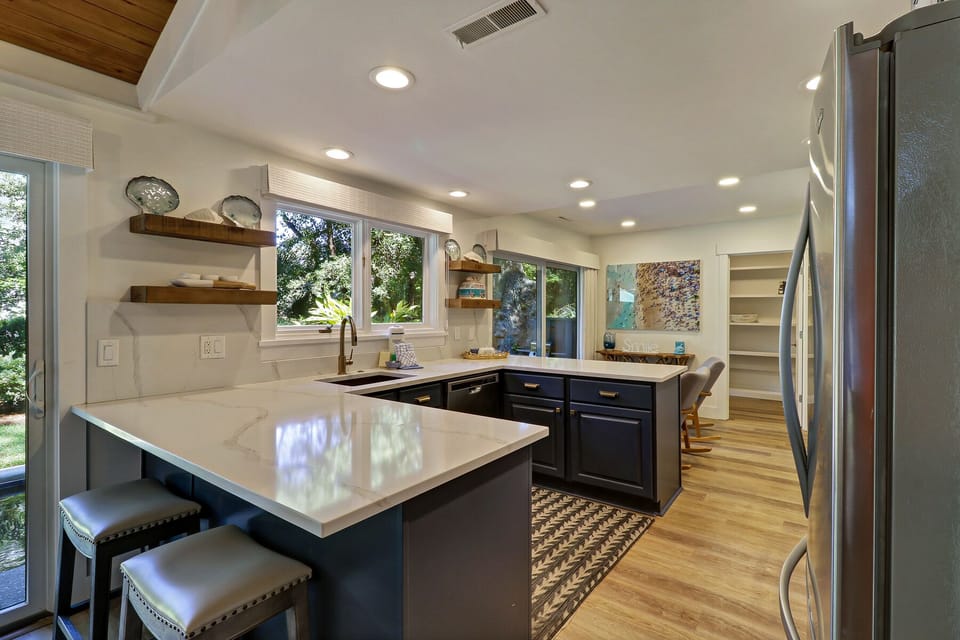 Gourmet kitchen with stainless steel appliances and gas stove