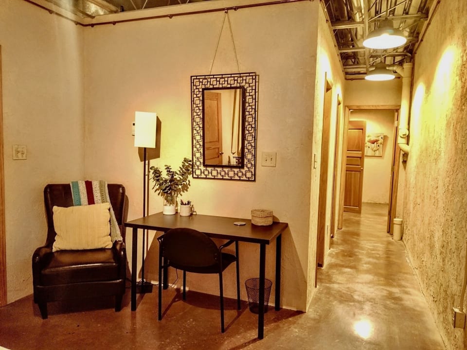 Lower level King bedroom with dedicated workspace. 