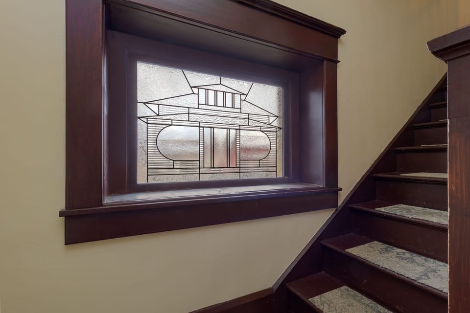 Beautiful handmade stained glass window of the Craftsman Home.