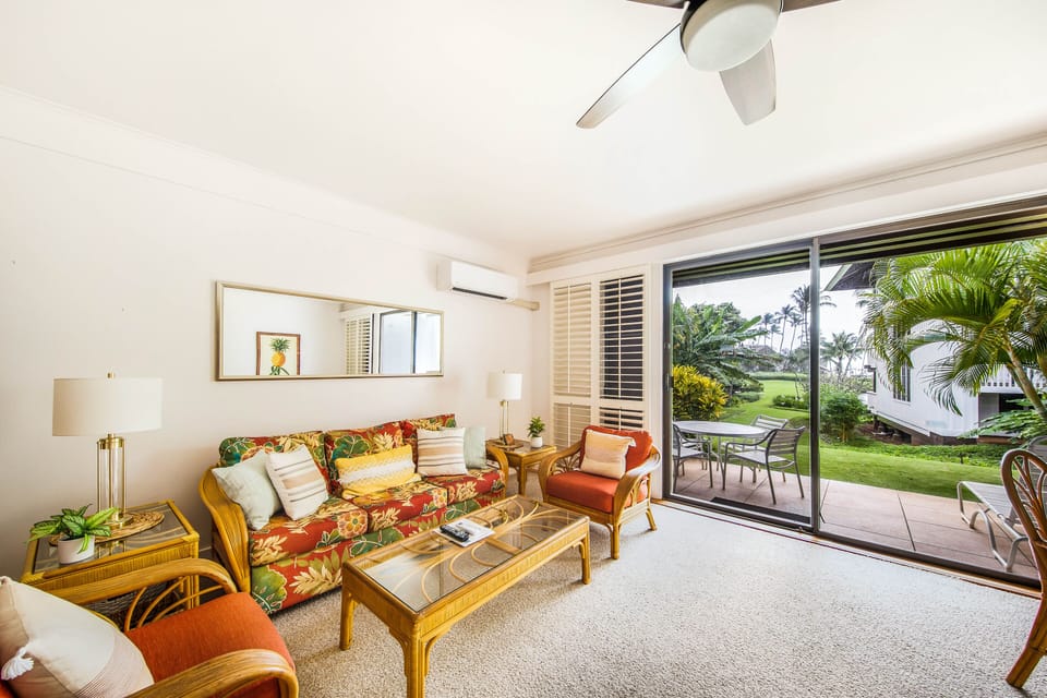Open concept kitchen and living with sliding glass doors onto your own patio