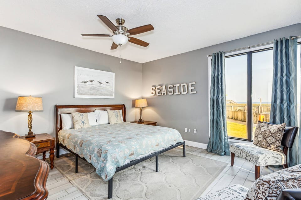 King guest bedroom with gulf views and patio access