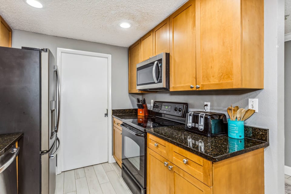 Fully equipped kitchen with all utensils and cookware