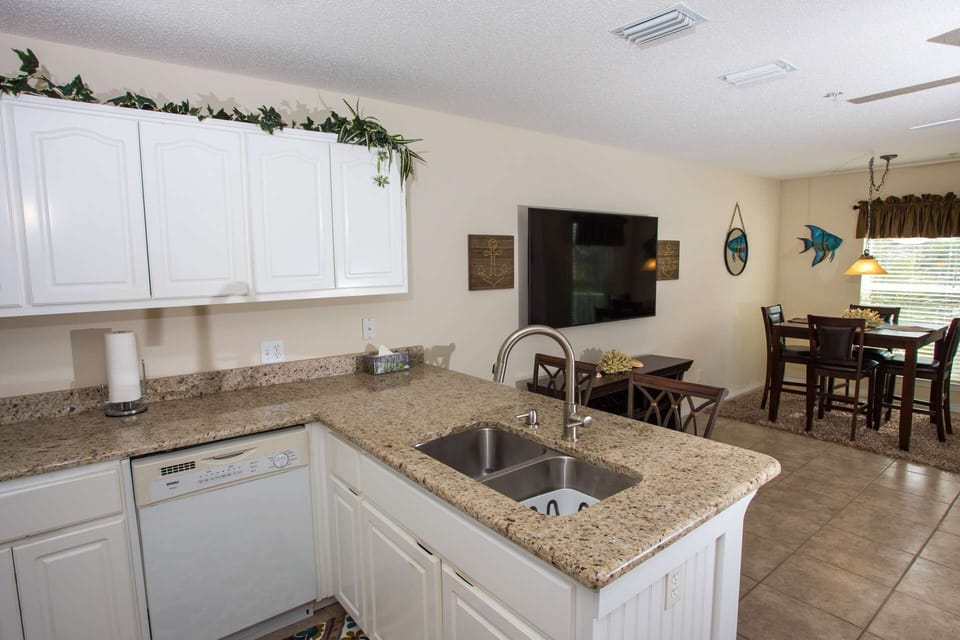 Open concept kitchen with granite counter tops