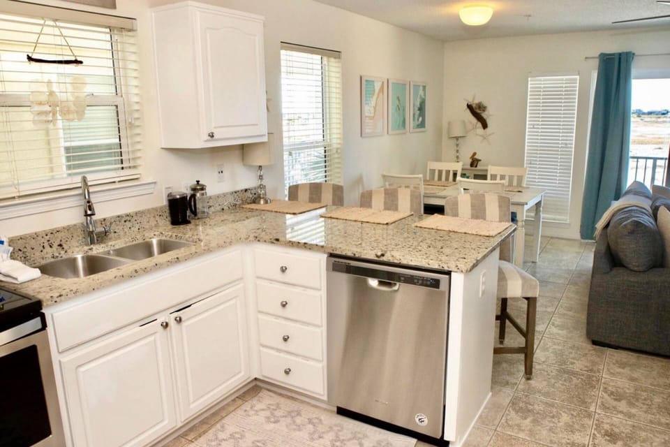 Open concept kitchen and dining area with views of the Gulf of Mexico