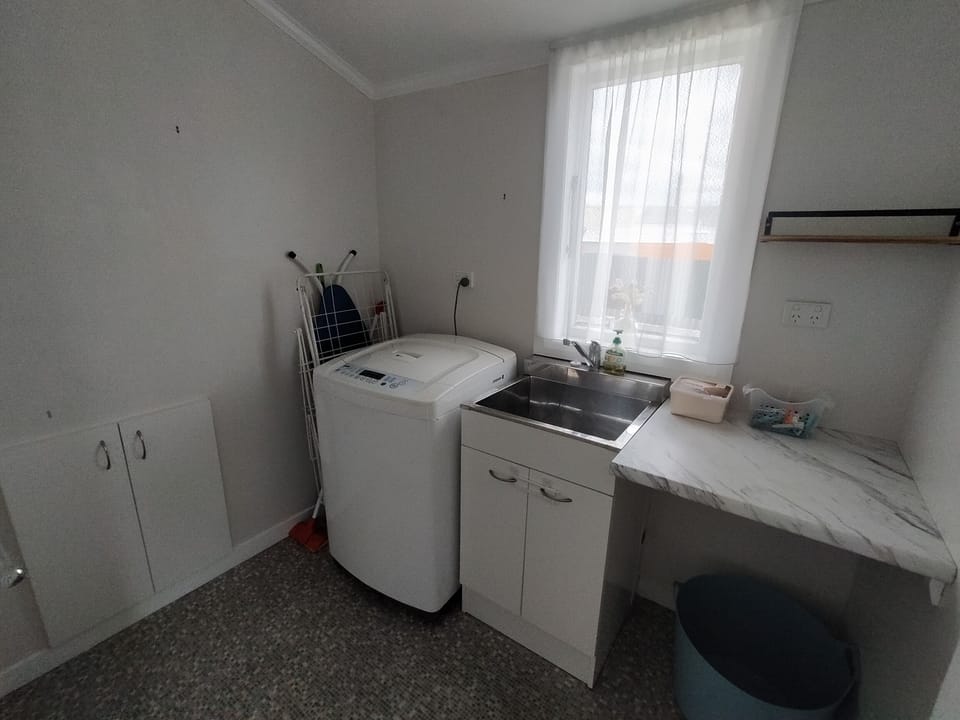 Laundry with large 8.5kg washing machine 