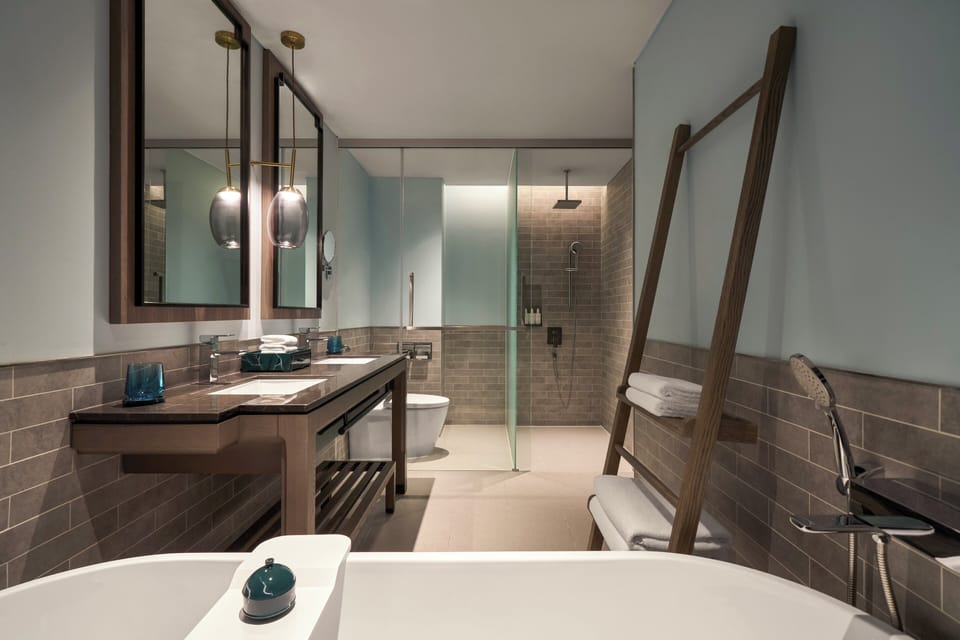 Separate tub and shower, deep soaking tub, rainfall showerhead