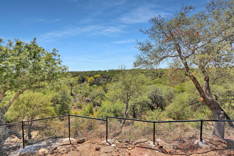 The backyard of the home has beautiful views of the Texas Hill Country.
