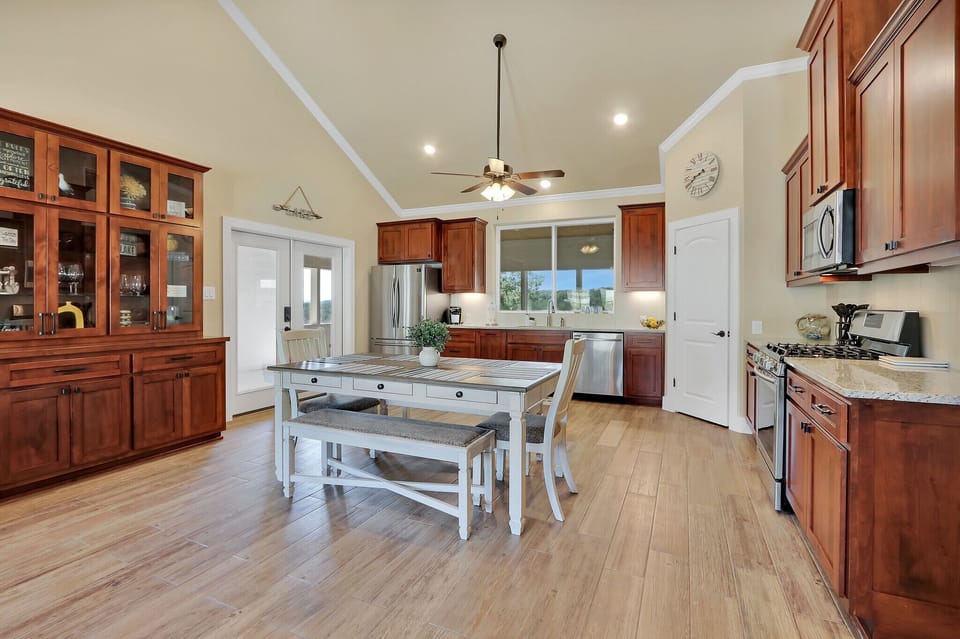 Closer view of the dining table walking toward the kichten.