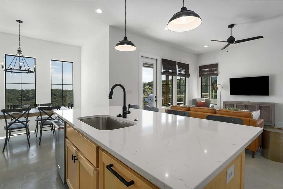 Modern and stylish kitchen with sleek countertops perfect for your culinary creations. 