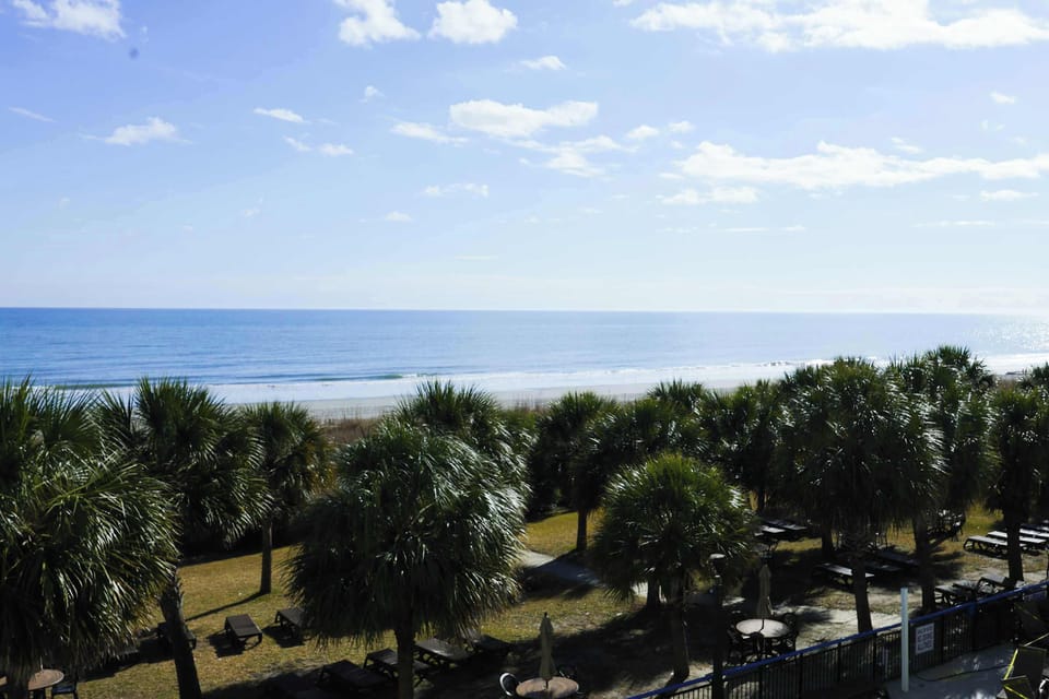 Enjoy unparalleled panoramic oceanfront views from your private balcony.