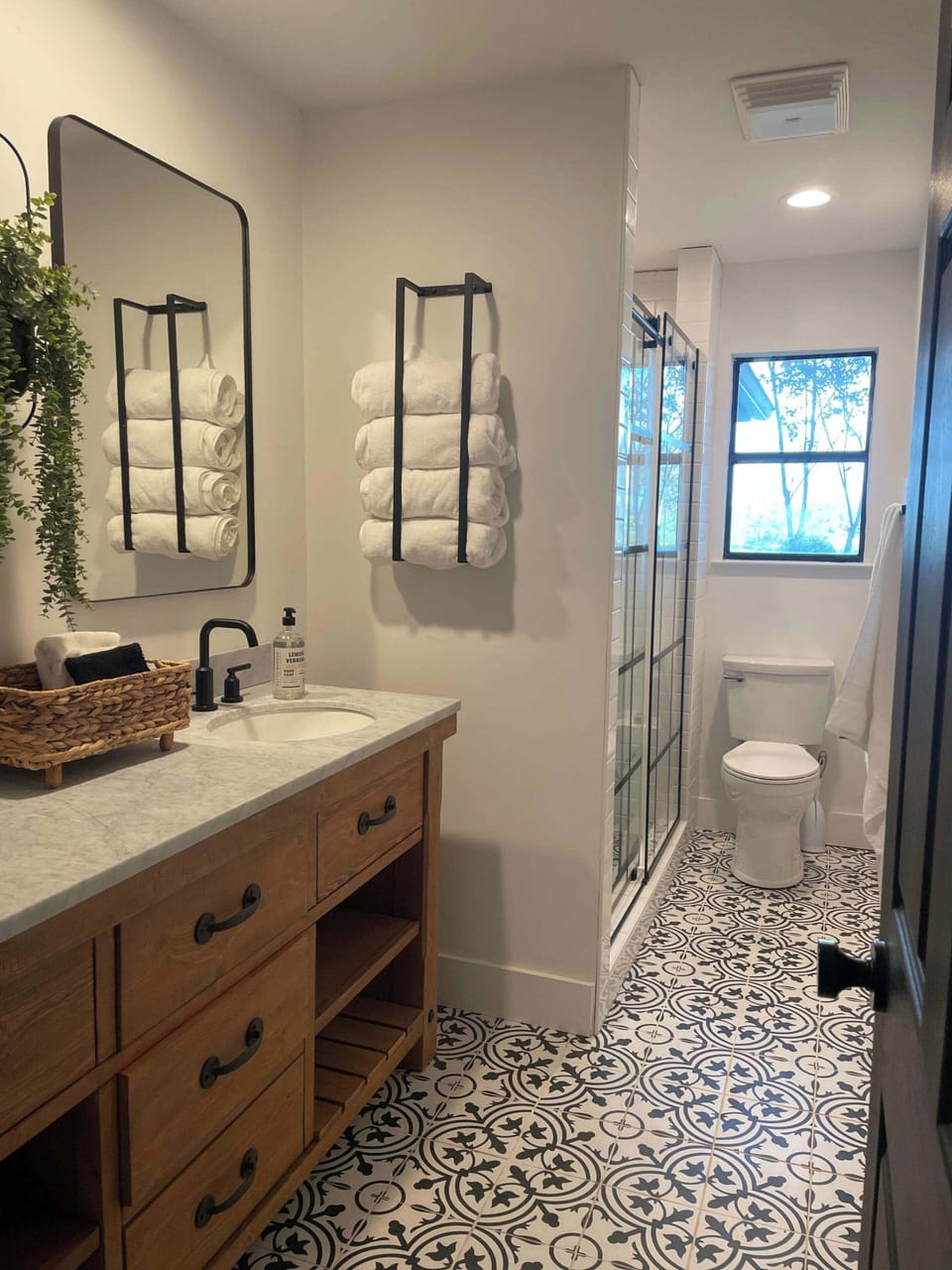 Hall Bathroom (2) with double vanity, shower and towel hooks for 4 people