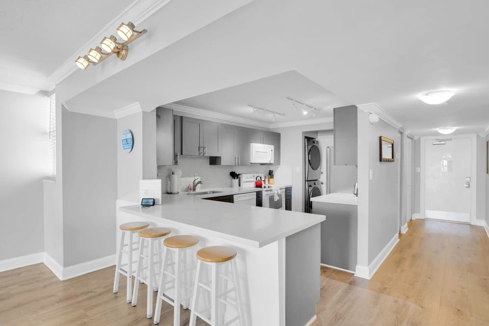 Remodeled kitchen with quartz countertops